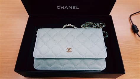 chanel white wallet blue trim chain|Chanel wallet on chain new.